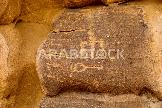 Rock drawings and writings, inscriptions from the Nabataean, Lihyanite, and Dadanite civilizations on rocks in the Al-Ula region and Mount Dadan, preserving the culture and history of our ancestors, archaeological inscription dating back to ancient times in the Kingdom of Saudi Arabia, fossils and historical sculptures