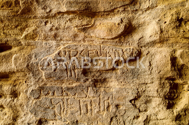Rock drawings and writings, inscriptions from the Nabataean, Lihyanite, and Dadanite civilizations on rocks in the Al-Ula region and Mount Dadan, preserving the culture and history of our ancestors, archaeological inscription dating back to ancient times in the Kingdom of Saudi Arabia, fossils and historical sculptures