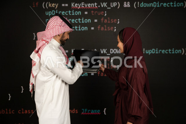 Saudi Gulf workforce working as a web developer, using a variety of programming languages to develop and build websites, technologies and computers, machine learning