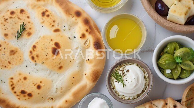 مخبوزات وفطائر طازجه ، وصفات طعام  خفيفه، اجبان والبان محليه وطنيه سعوديه، صورة علويه عاموديه لأطباق الفطور المتنوعه