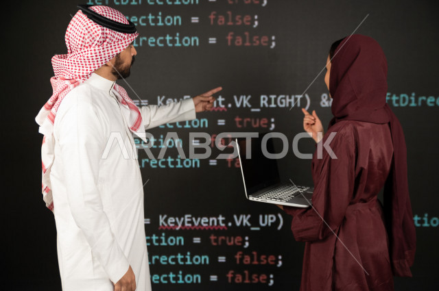 Saudi Gulf workforce working as a web developer, using a variety of programming languages to develop and build websites, technologies and computers, machine learning