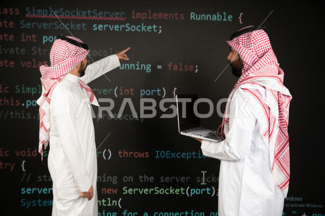 Saudi Gulf workforce working as a web developer, using a variety of programming languages to develop and build websites, technologies and computers, machine learning