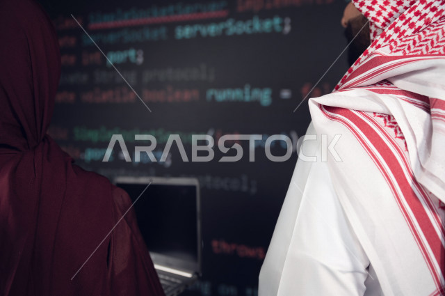 Saudi Gulf workforce working as a web developer, using a variety of programming languages to develop and build websites, technologies and computers, machine learning