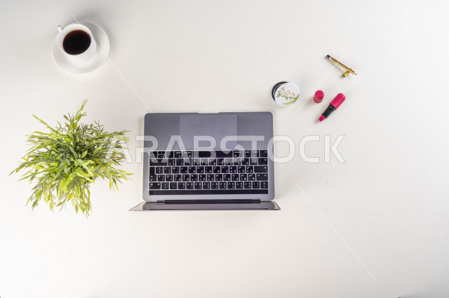 Close up from above, of a work environment dedicated to beautification, professions and jobs, white background.