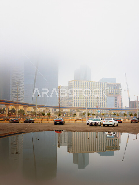 تجمع المياه امام مركز الملك عبد الله المالي (كافد)، المنشآت والأبراج المالية في مدينة الرياض في فصل الشتاء، الفن الهندسي المعماري للمباني وناطحات السحاب المشهورة في المملكة، تحقيق النهضة الاقتصادية والتجارية، النمو والتطور العمراني في السعودية