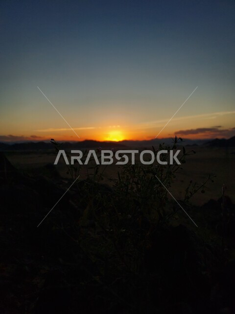 Sunset view on the Mandassa Mountains in Medina, mountain peaks and heights, tourist attractions and places, distinct natural landscapes in the Kingdom of Saudi Arabia 