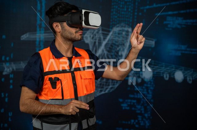 خاصية الهولوجرام ، مهندس سعودي ماهر محترف في صناعة الطائرات، رجل مهندس خليجي ، استخدام تقنية الهولوجرام ثلاثية الابعاد ، صور تجسيمية خاصة بمجسمات الطائرات و هياكلها ، صور متحركة بأبعاد مختلفة ، تصوير ثلاثي الابعاد للأجسام