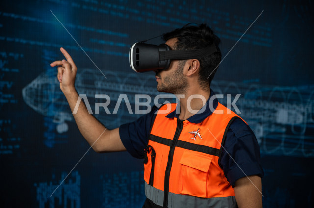 خاصية الهولوجرام ، مهندس سعودي ماهر محترف في صناعة الطائرات، رجل مهندس خليجي ، استخدام تقنية الهولوجرام ثلاثية الابعاد ، صور تجسيمية خاصة بمجسمات الطائرات و هياكلها ، صور متحركة بأبعاد مختلفة ، تصوير ثلاثي الابعاد للأجسام