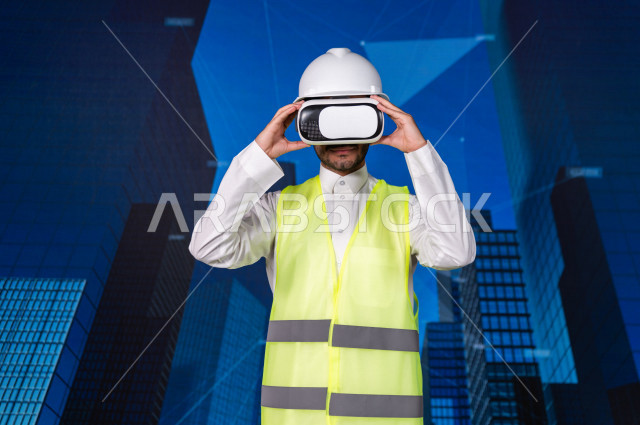 خاصية الهولوجرام  ، مهندس سعودي ماهر محترف في التخطيط ، رجل مهندس خليجي ، استخدام تقنية الهولوجرام ثلاثية الابعاد ، صور تجسيمية خاصة بالمنشأت و الابراج المعمارية ، صور هندسية بأبعاد مختلفة ، تصوير ثلاثي الابعاد للأجسام 