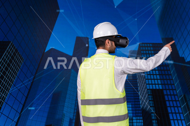 خاصية الهولوجرام  ، مهندس سعودي ماهر محترف في التخطيط ، رجل مهندس خليجي ، استخدام تقنية الهولوجرام ثلاثية الابعاد ، صور تجسيمية خاصة بالمنشأت و الابراج المعمارية ، صور هندسية بأبعاد مختلفة ، تصوير ثلاثي الابعاد للأجسام 