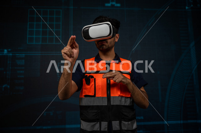 خاصية الهولوجرام  ، مهندس سعودي ماهر محترف في التخطيط ، رجل مهندس خليجي ، استخدام تقنية الهولوجرام ثلاثية الابعاد ، صور تجسيمية خاصة بالمنشأت و الابراج المعمارية ، صور هندسية بأبعاد مختلفة ، تصوير ثلاثي الابعاد للأجسام 
