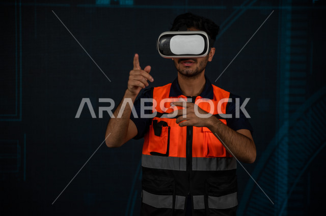 خاصية الهولوجرام  ، مهندس سعودي ماهر محترف في التخطيط ، رجل مهندس خليجي ، استخدام تقنية الهولوجرام ثلاثية الابعاد ، صور تجسيمية خاصة بالمنشأت و الابراج المعمارية ، صور هندسية بأبعاد مختلفة ، تصوير ثلاثي الابعاد للأجسام 