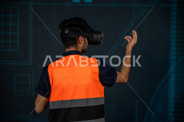 خاصية الهولوجرام  ، مهندس سعودي ماهر محترف في التخطيط ، رجل مهندس خليجي ، استخدام تقنية الهولوجرام ثلاثية الابعاد ، صور تجسيمية خاصة بالمنشأت و الابراج المعمارية ، صور هندسية بأبعاد مختلفة ، تصوير ثلاثي الابعاد للأجسام 