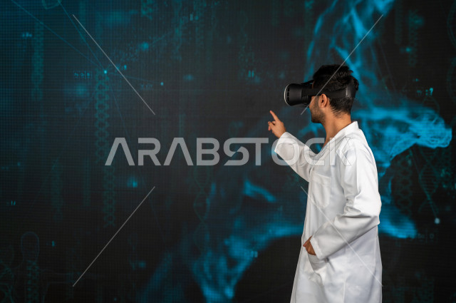 Hologram feature, a Saudi Gulf doctor with high experience in the field of human medicine, puts a VR Box device, using 3D hologram technology, stereoscopic images of human structures and organs, moving images in different dimensions, 3D imaging of bodies