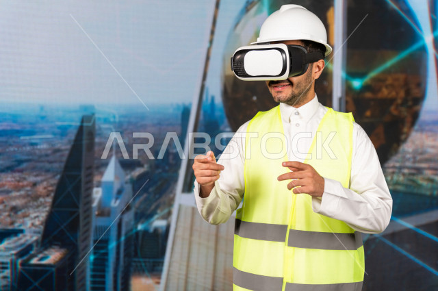 خاصية الهولوجرام  ، مهندس سعودي ماهر محترف في التخطيط ، رجل مهندس خليجي ، استخدام تقنية الهولوجرام ثلاثية الابعاد ، صور تجسيمية خاصة بالمنشأت و الابراج المعمارية ، صور هندسية بأبعاد مختلفة ، تصوير ثلاثي الابعاد للأجسام 