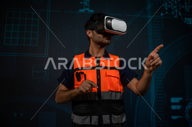 خاصية الهولوجرام  ، مهندس سعودي ماهر محترف في التخطيط ، رجل مهندس خليجي ، استخدام تقنية الهولوجرام ثلاثية الابعاد ، صور تجسيمية خاصة بالمنشأت و الابراج المعمارية ، صور هندسية بأبعاد مختلفة ، تصوير ثلاثي الابعاد للأجسام 