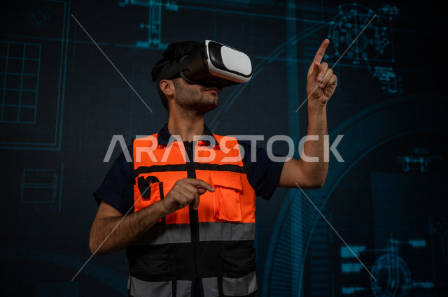 خاصية الهولوجرام  ، مهندس سعودي ماهر محترف في التخطيط ، رجل مهندس خليجي ، استخدام تقنية الهولوجرام ثلاثية الابعاد ، صور تجسيمية خاصة بالمنشأت و الابراج المعمارية ، صور هندسية بأبعاد مختلفة ، تصوير ثلاثي الابعاد للأجسام 