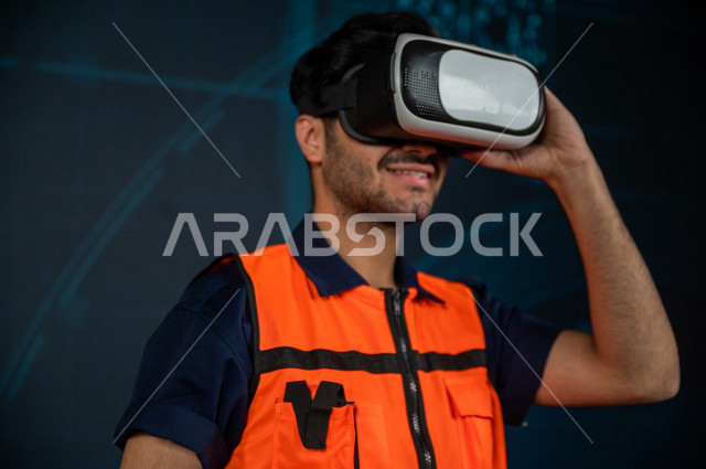 خاصية الهولوجرام  ، مهندس سعودي ماهر محترف في التخطيط ، رجل مهندس خليجي ، استخدام تقنية الهولوجرام ثلاثية الابعاد ، صور تجسيمية خاصة بالمنشأت و الابراج المعمارية ، صور هندسية بأبعاد مختلفة ، تصوير ثلاثي الابعاد للأجسام 