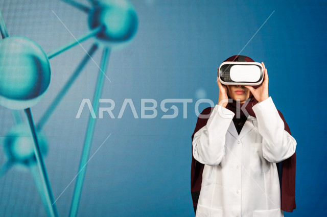 خاصية الهولوجرام ، طبيبة سعودية خليجية ذو خبرة عالية في مجال الطب البشري  ،تضع جهازVR Box،  استخدام تقنية الهولوجرام ثلاثية الابعاد ، صور تجسيمية خاصة بمجسمات الهياكل البشرية  و الاعضاء ، صور متحركة بأبعاد مختلفة ، تصوير ثلاثي الابعاد للأجسام