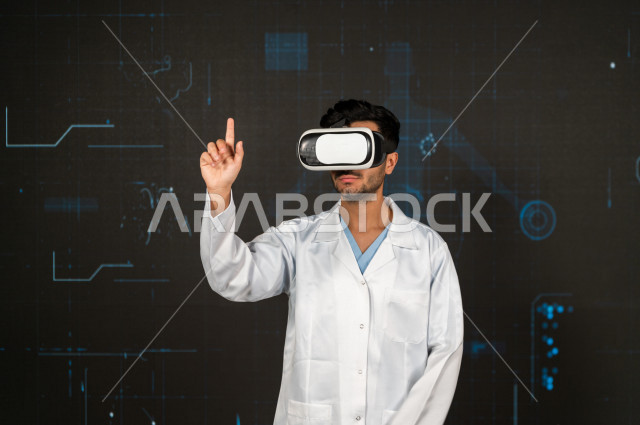 خاصية الهولوجرام ، طبيبب سعودي خليجي ذو خبرة عالية في مجال الطب البشري  ،يضع جهازVR Box،  استخدام تقنية الهولوجرام ثلاثية الابعاد ، صور تجسيمية خاصة بمجسمات الهياكل البشرية  و الاعضاء ، صور متحركة بأبعاد مختلفة ، تصوير ثلاثي الابعاد للأجسام