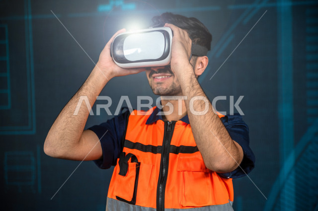 خاصية الهولوجرام  ، مهندس سعودي ماهر محترف في التخطيط ، رجل مهندس خليجي ، استخدام تقنية الهولوجرام ثلاثية الابعاد ، صور تجسيمية خاصة بالمنشأت و الابراج المعمارية ، صور هندسية بأبعاد مختلفة ، تصوير ثلاثي الابعاد للأجسام 