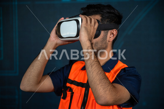 خاصية الهولوجرام  ، مهندس سعودي ماهر محترف في التخطيط ، رجل مهندس خليجي ، استخدام تقنية الهولوجرام ثلاثية الابعاد ، صور تجسيمية خاصة بالمنشأت و الابراج المعمارية ، صور هندسية بأبعاد مختلفة ، تصوير ثلاثي الابعاد للأجسام 