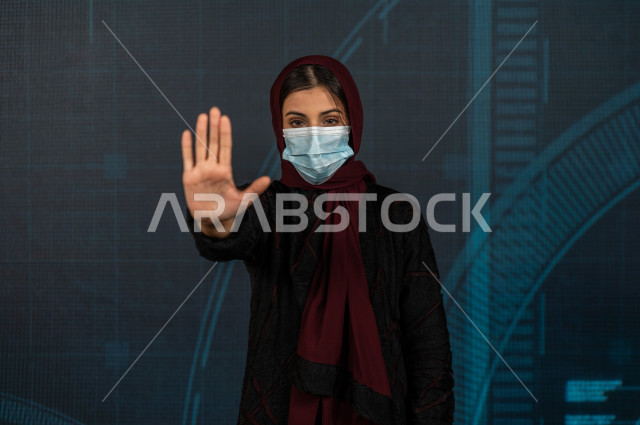 Hologram property, a skilled Saudi engineer, a professional in planning, a Gulf engineer woman, the use of 3D hologram technology, stereoscopic images of buildings and architectural towers, engineering images of different dimensions, three-dimensional ima