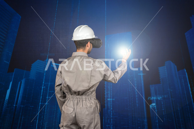 خاصية الهولوجرام  ، مهندس سعودي ماهر محترف في التخطيط ، رجل مهندس خليجي ، استخدام تقنية الهولوجرام ثلاثية الابعاد ، صور تجسيمية خاصة بالمنشأت و الابراج المعمارية ، صور هندسية بأبعاد مختلفة ، تصوير ثلاثي الابعاد للأجسام 