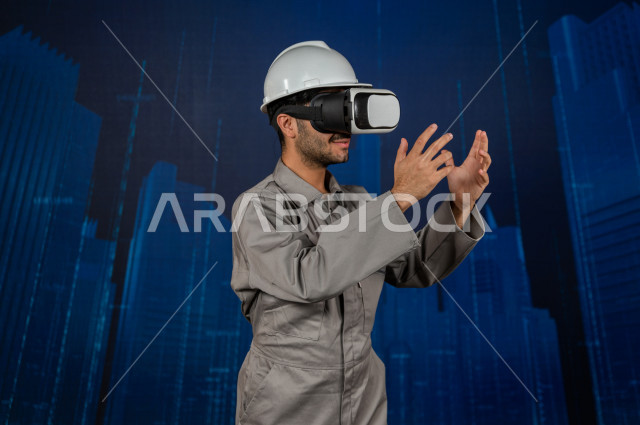 خاصية الهولوجرام  ، مهندس سعودي ماهر محترف في التخطيط ، رجل مهندس خليجي ، استخدام تقنية الهولوجرام ثلاثية الابعاد ، صور تجسيمية خاصة بالمنشأت و الابراج المعمارية ، صور هندسية بأبعاد مختلفة ، تصوير ثلاثي الابعاد للأجسام 