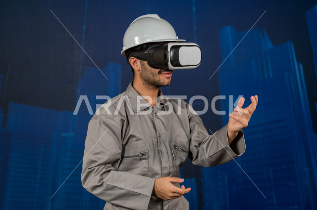 خاصية الهولوجرام  ، مهندس سعودي ماهر محترف في التخطيط ، رجل مهندس خليجي ، استخدام تقنية الهولوجرام ثلاثية الابعاد ، صور تجسيمية خاصة بالمنشأت و الابراج المعمارية ، صور هندسية بأبعاد مختلفة ، تصوير ثلاثي الابعاد للأجسام 