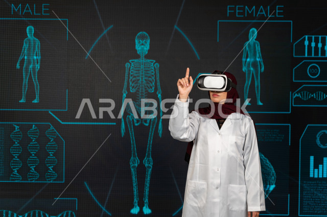 خاصية الهولوجرام ، طبيبة سعودية خليجية ذو خبرة عالية في مجال الطب البشري  ،تضع جهازVR Box،  استخدام تقنية الهولوجرام ثلاثية الابعاد ، صور تجسيمية خاصة بمجسمات الهياكل البشرية  و الاعضاء ، صور متحركة بأبعاد مختلفة ، تصوير ثلاثي الابعاد للأجسام