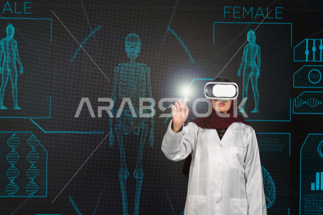 خاصية الهولوجرام ، طبيبة سعودية خليجية ذو خبرة عالية في مجال الطب البشري  ،تضع جهازVR Box،  استخدام تقنية الهولوجرام ثلاثية الابعاد ، صور تجسيمية خاصة بمجسمات الهياكل البشرية  و الاعضاء ، صور متحركة بأبعاد مختلفة ، تصوير ثلاثي الابعاد للأجسام