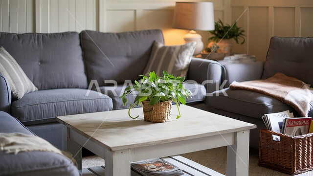 طاولة خشبية عليها نبات الزينة المنزلي، الأثاث المنزلي المريح، غرفة معيشة بتصاميم وديكورات عصرية، شقق وفلل سكنية في المملكة العربية السعودية، ديكور داخلي راقي لغرفة الجلوس، التحف والاكسسوارات البسيطة