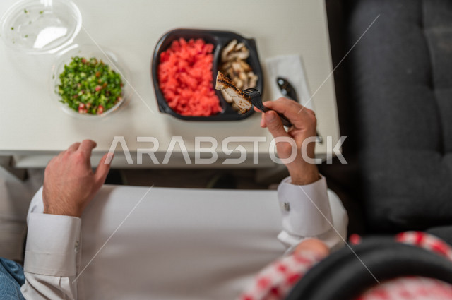 A healthy meal consisting of grilled chicken and a little boiled rice for a healthy and beneficial meal, hot dishes, healthy meals for a slim body, ideal weight.