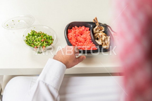 A healthy meal consisting of grilled chicken and a little boiled rice for a healthy and beneficial meal, hot dishes, healthy meals for a slim body, ideal weight.