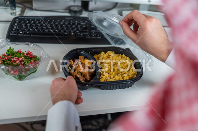 A complete healthy meal consisting of fresh vegetable salad and a plate of meat with a little healthy rice, a diet for a lean body and an ideal weight, cold appetizers and hot meals.