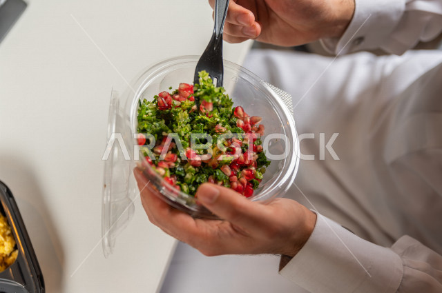 Fresh green tabbouleh dish is healthy , cold appetizers.