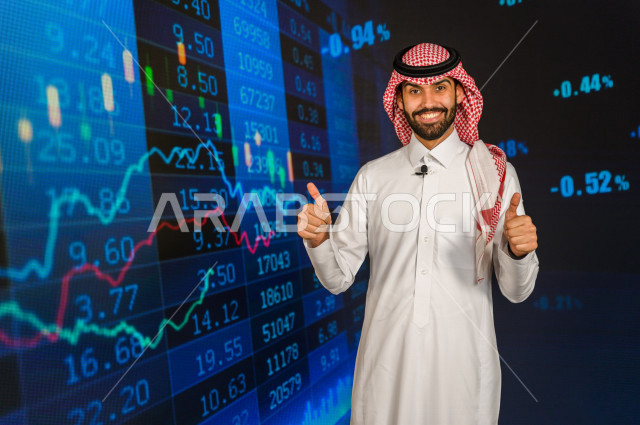 مذيع و اعلامي سعودي خليجي يمتلك المهارة بتقديم النشرات الاخبارية الاقتصادية ، ايماءات وجه و يدين تدل على الفوز و صعود اسهم البورصة ، استخدام تقنية الجرافيكس في تقديم الاخبار و الاحصائيات الخاصة ، أخبار عالمية اقتصادية ،نشرة الإحصاءات الاقتصادية للدول العر