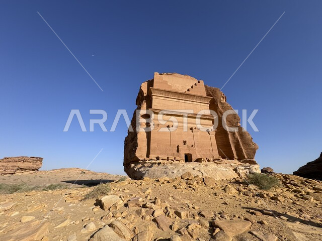 Rock formations in desert areas, historical natural places, ancient archaeological monuments in the Kingdom of Saudi Arabia, attracting and attracting tourists from all over the world, Al-Farid Palace in Mada’in Saleh in Al-Ula Governorate, the tomb of Hayyan bin Kuza