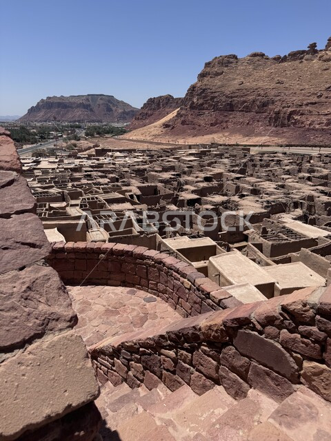 Ancient historical landmarks and areas, traditional mud houses and houses, mountain peaks and heights, archaeological buildings in the old town in Al-Ula Governorate in the Kingdom of Saudi Arabia, rock formations and formations in tourist places.