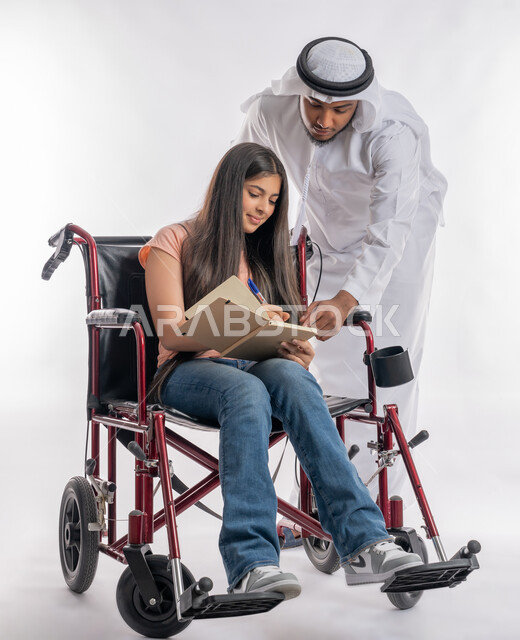 Providing assistance to people of determination, a portrait of an Emirati Gulf Arab man wearing a ghutra and kandura helping his disabled daughter to do school homework, Emirati community support for the disabled and their education, developing writing skills for people with special needs, white background