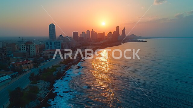 The waterfront in the Kingdom of Saudi Arabia at sunset, Saudi urban development and progress, famous tourist attractions and places, aerial photo of towers and skyscrapers overlooking the Red Sea coast, water landscapes, visitor attractions to the coastal city of Jeddah