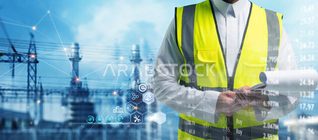 الاشراف على صيانة الأبراج الكهربائية، صورة مقربة لمهندس كهرباء عربي خليجي سعودي يرتدي سترة الحماية الخاصة بالعمل يحمل بيده اوراق المهام والملاحظات، العمل في المجال الهندسي في المملكة العربية السعودية، خلفية ايقونات هولوجرامية لأشكال هندسيه مختلفه