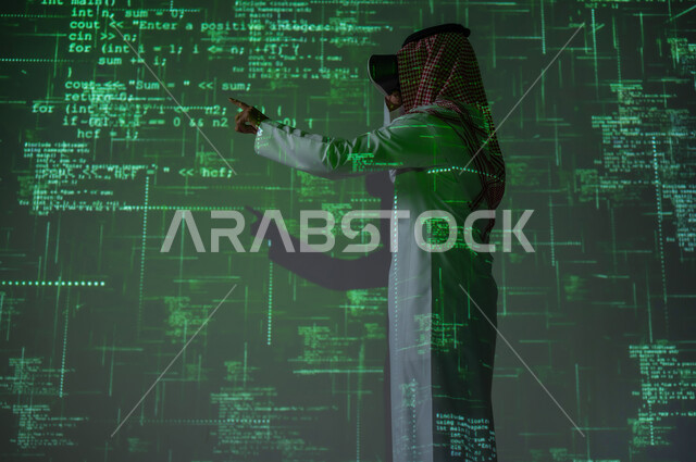 Simulating the virtual world, developing and building websites and electronic applications, a Saudi Gulf Arab man wearing a traditional thobe and shemagh, wearing VR glasses, pointing with his index finger at the codes, a 3D holographic background