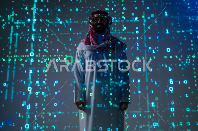 علوم الحاسوب و البرمجة , مفهوم الأكواد و الخوارزميات , رجل عربي خليجي سعودي يرتدي الثوب التقليدي و الشماغ , التقدم التقني و التكنولوجي , تحليل و فهم اللغات البرمجية , خلفية هولوجرامية ثلاثية الأبعاد