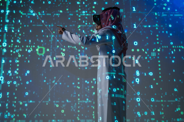 Gestures of integration into the virtual world, the concept of programming languages ​​and algorithms, a Saudi Gulf Arab man wearing a traditional thobe and shemagh wearing VR glasses, technical and digital development, a 3D holographic background