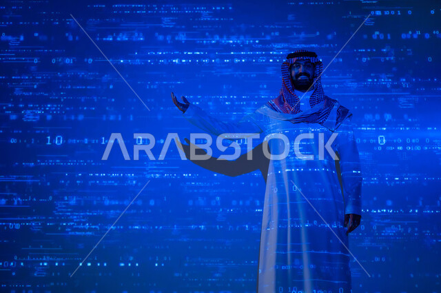 مفهوم التطور التقني , رجل عربي خليجي سعودي يرتدي الثوب التقليدي و الشماغ يقوم بالإشارة بيده , التقدم التكنولوجي في السعودية , خلفية هولوجرامية ثلاثية الأبعاد