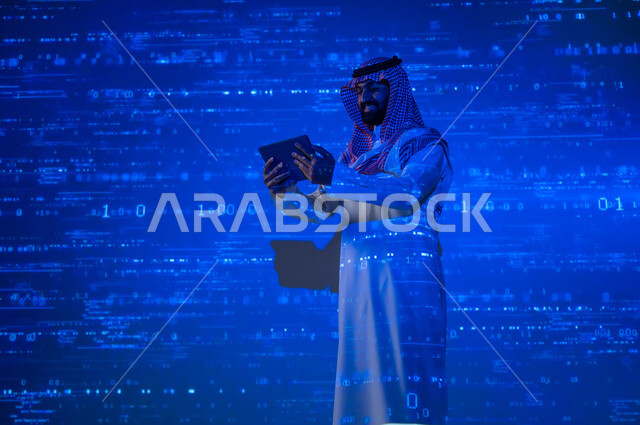 The development of digital technology, technical progress and growth, a Saudi Gulf Arab man wearing a traditional thobe and shemagh holding a tablet in his hand, a 3D hologram background