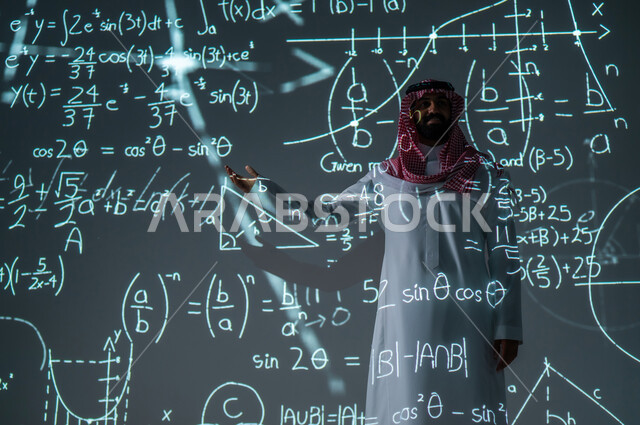 The use of modern electronic devices, scientific and technical development in the Kingdom of Saudi Arabia, integrating science and technology into mathematics, a smiling Saudi Gulf Arab young man wearing the traditional dress and shemagh pointing to mathematical equations and laws, the background is mathematical laws and algorithms