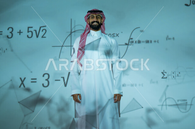 التطور العلمي والتقني في المملكة العربية السعودية، دمج العلم بالتكنولوجيا في مادة الرياضيات، استخدام الوسائل والتقنيات الحديثة، شاب عربي خليجي سعودي يرتدي الثوب التقليدي والشماغ يقف أمام المعادلات الحسابية والقوانين الرياضية، الخلفية قوانين وخوارزميات رياضية